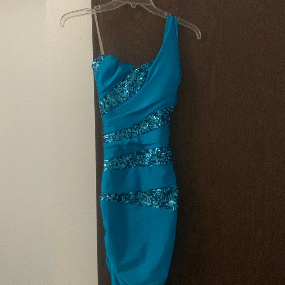 Brand new mermaid style dress blue with blue shimmer effect very beautiful